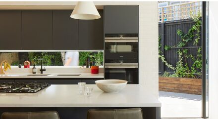 Brixton House by Studio Carver with hidden glass pocket doors